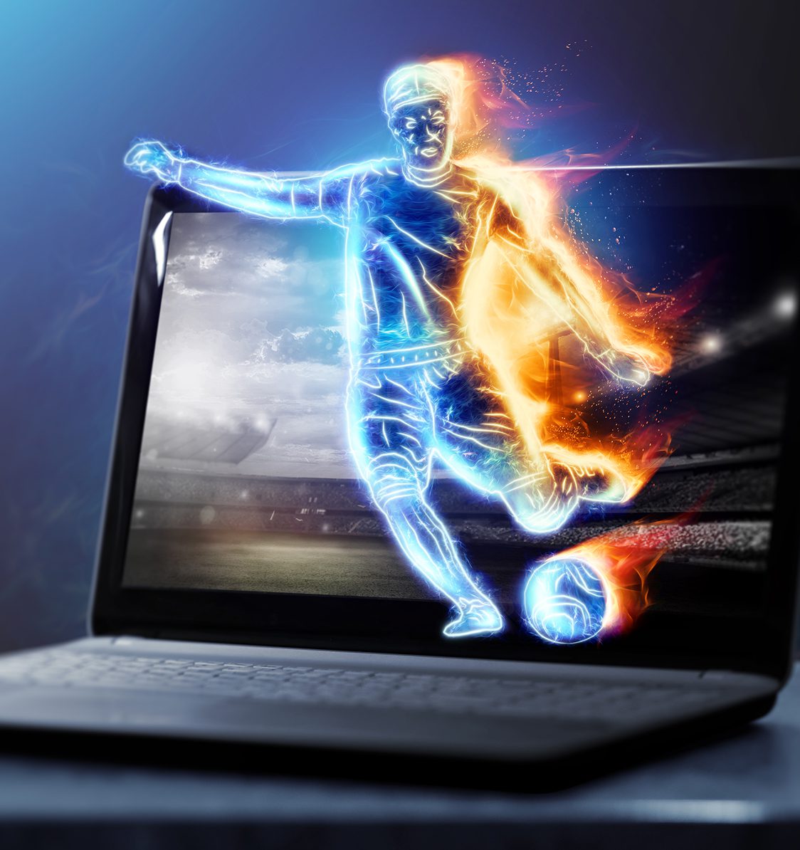 A glowing digital figure of a soccer player, half blue and half orange, kicks a ball as it emerges from a laptop screen in a stadium setting.